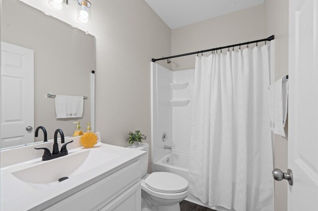 17810 Planted Orchard Dr, Hockley, TX 77447 - full bathroom with vanity, toilet, and shower / bath combo with shower curtain