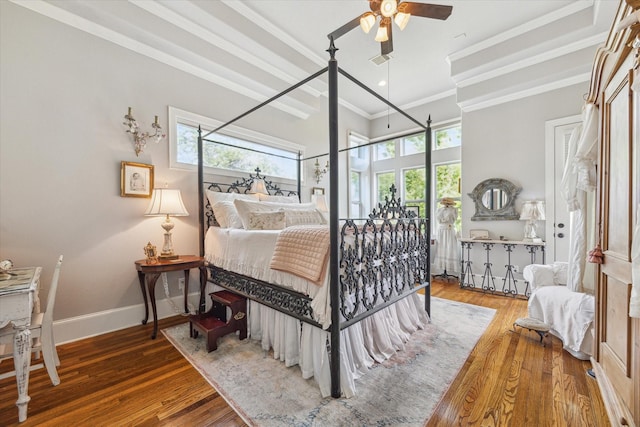 414 E 28th St, Houston, TX 77008 - bedroom with crown molding, wood finished floors, and baseboards