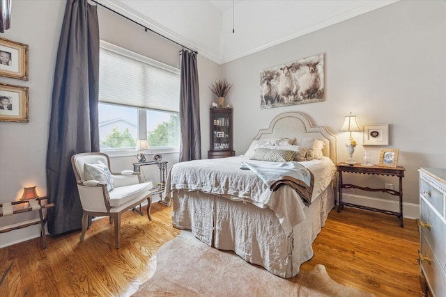 414 E 28th St, Houston, TX 77008 - bedroom featuring wood finished floors and baseboards