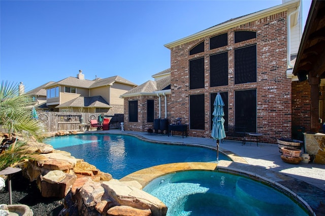 22734 Newcourt Place St, Tomball, TX 77375 - view of pool featuring a patio and a pool with connected hot tub