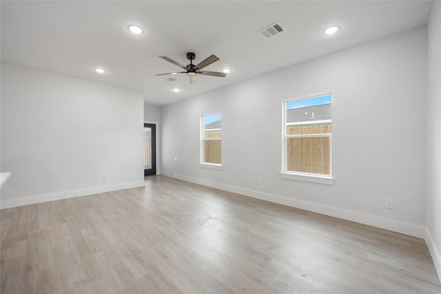 8221 Tower St, Houston, TX 77088 - empty room featuring a ceiling fan, recessed lighting, baseboards, and light wood-type flooring