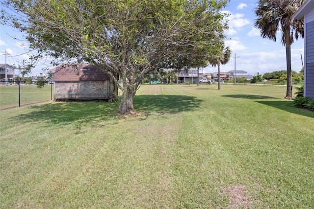 927 W Verdie Dr, Crystal Beach, TX 77650 - view of yard with an outbuilding