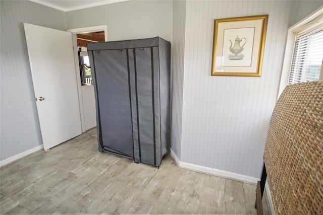 927 W Verdie Dr, Crystal Beach, TX 77650 - unfurnished bedroom featuring wood finished floors and baseboards