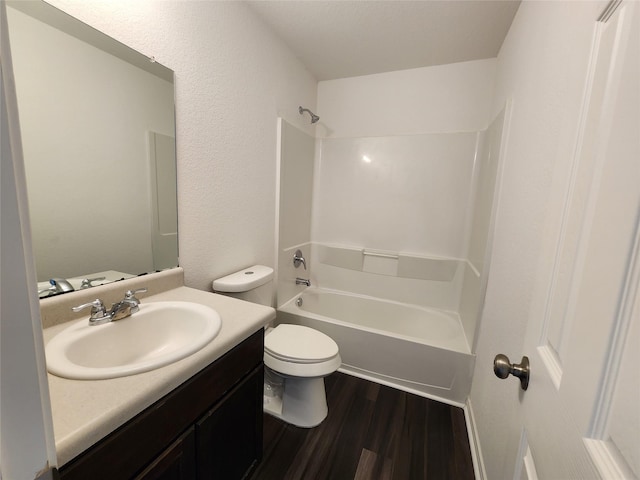 207 Branch Cir, Kendleton, TX 77451 - bathroom featuring toilet, vanity, wood finished floors, and tub / shower combination