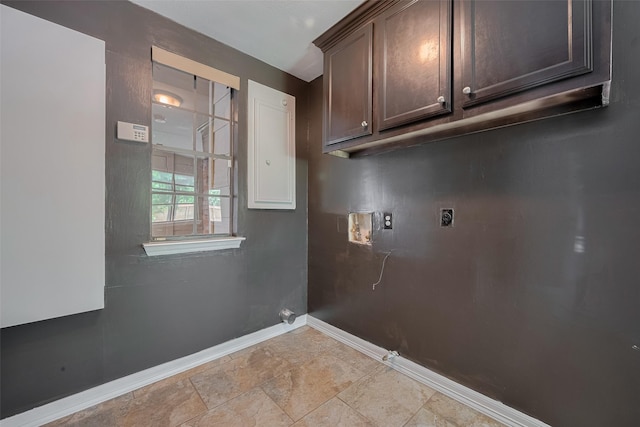 15509 Lakeview Dr, Jersey Village, TX 77040 - laundry area with hookup for an electric dryer, baseboards, hookup for a washing machine, cabinet space, and gas dryer hookup