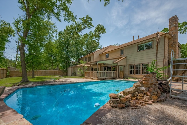 15509 Lakeview Dr, Jersey Village, TX 77040 - view of swimming pool with a fenced backyard and a wooden deck