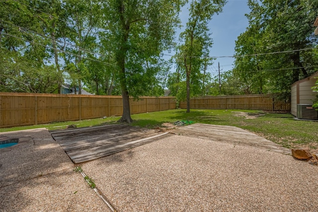 15509 Lakeview Dr, Jersey Village, TX 77040 - view of yard with a patio and cooling unit