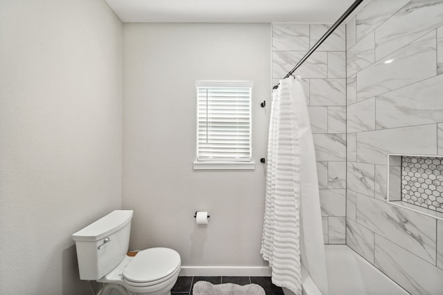 7332 Kurt Dr, Brenham, TX 77833 - bathroom with toilet, shower / tub combo, and baseboards