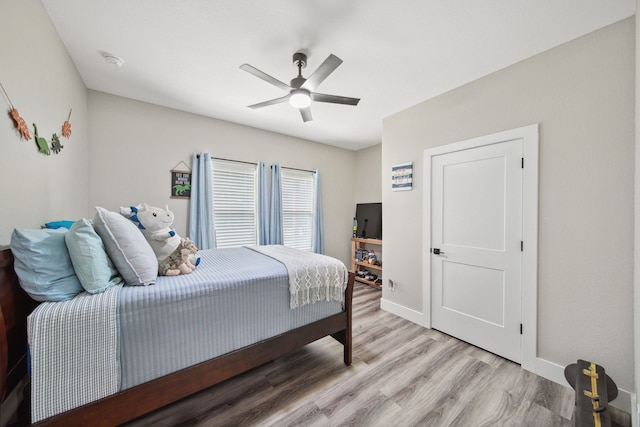 7332 Kurt Dr, Brenham, TX 77833 - bedroom featuring light wood-style floors, baseboards, and ceiling fan