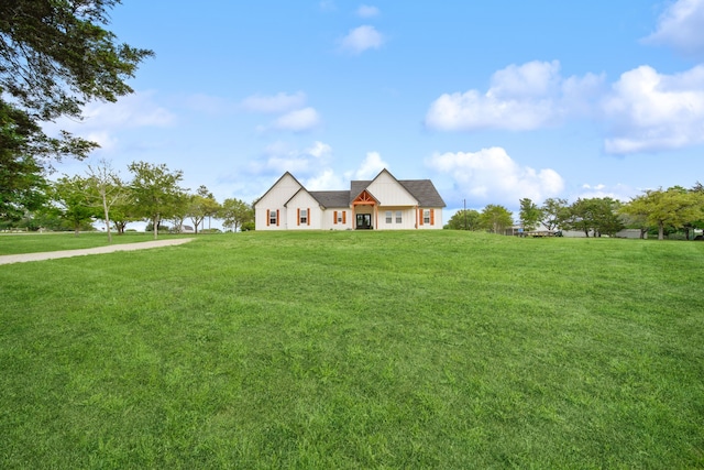 7332 Kurt Dr, Brenham, TX 77833 - modern inspired farmhouse featuring a front lawn