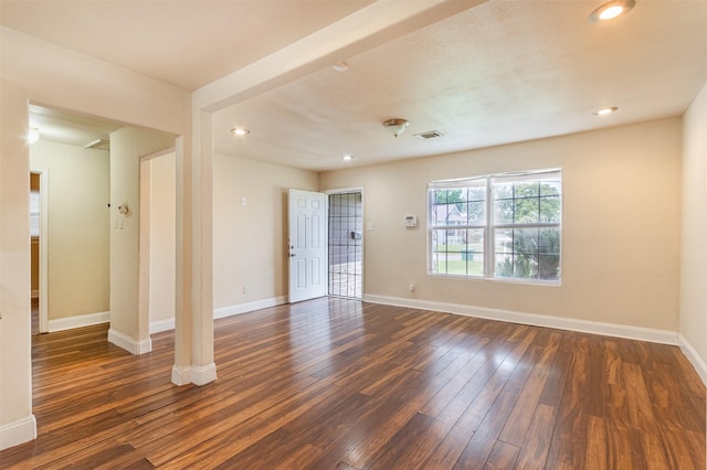 10601 Murr Way, Houston, TX 77048 - unfurnished room featuring dark wood-type flooring, baseboards, and recessed lighting