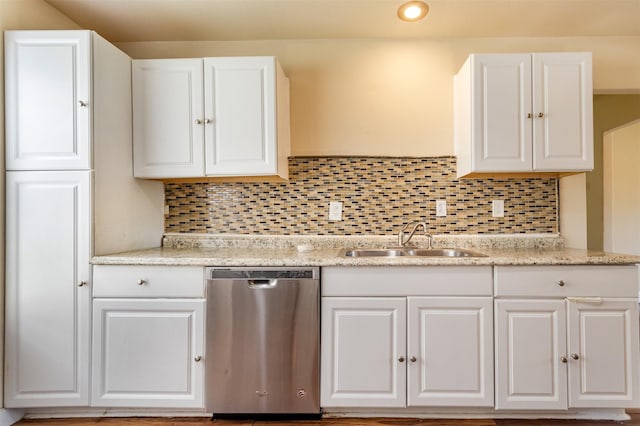 10601 Murr Way, Houston, TX 77048 - kitchen with dishwasher, a sink, white cabinets, decorative backsplash, and recessed lighting