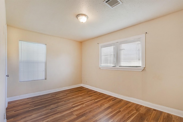 10601 Murr Way, Houston, TX 77048 - empty room with wood finished floors and baseboards