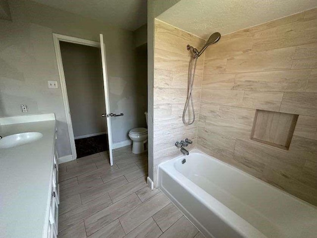 706 Redleaf Ln, Houston, TX 77090 - full bathroom featuring toilet, vanity, and bathtub / shower combination