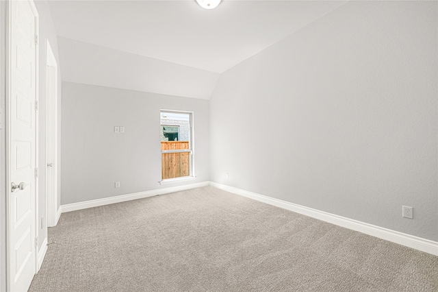 19236 Yellow Chestnut Ln, New Caney, TX 77357 - carpeted spare room with lofted ceiling and baseboards