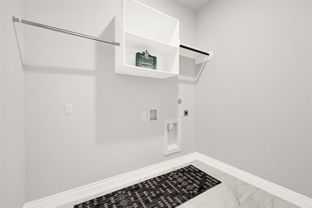 19236 Yellow Chestnut Ln, New Caney, TX 77357 - laundry area with hookup for an electric dryer, gas dryer hookup, light marble finish flooring, hookup for a washing machine, and baseboards