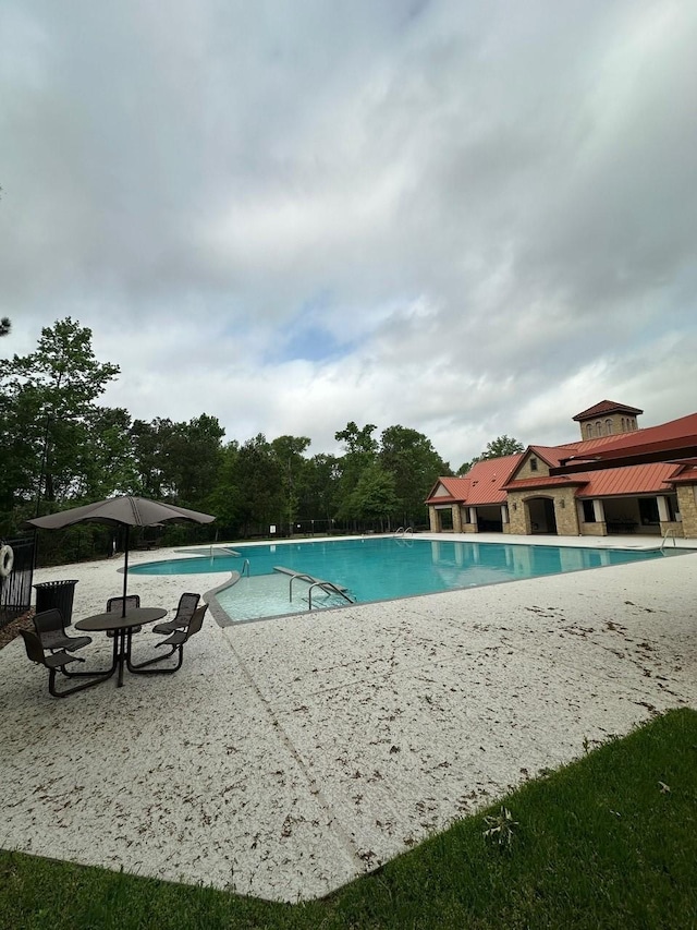 19236 Yellow Chestnut Ln, New Caney, TX 77357 - community pool with a patio