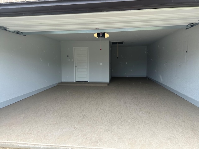 19236 Yellow Chestnut Ln, New Caney, TX 77357 - garage with a garage door opener and baseboards