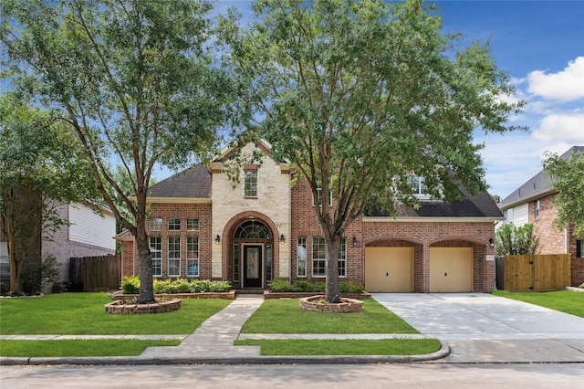 20911 Lonely Star Ln, Richmond, TX 77406 - traditional home featuring brick siding, concrete driveway, a garage, and a shingled roof