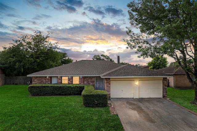 14118 Magnolia Springs Dr, Houston, TX 77066 - ranch-style home with a garage, driveway, roof with shingles, and brick siding
