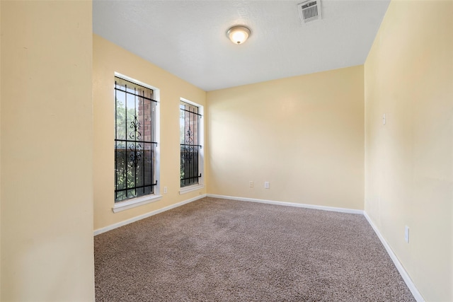 14118 Magnolia Springs Dr, Houston, TX 77066 - empty room with carpet flooring and baseboards