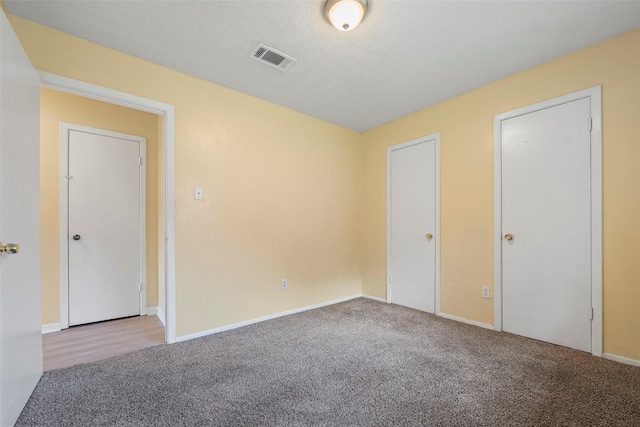 14118 Magnolia Springs Dr, Houston, TX 77066 - unfurnished bedroom with carpet floors and baseboards
