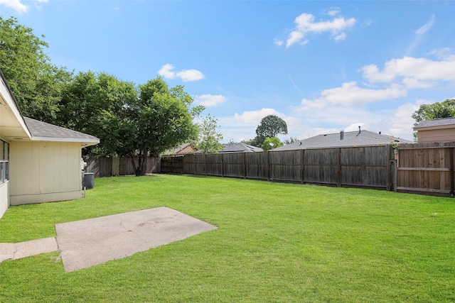 14118 Magnolia Springs Dr, Houston, TX 77066 - view of yard featuring a patio area and central AC unit