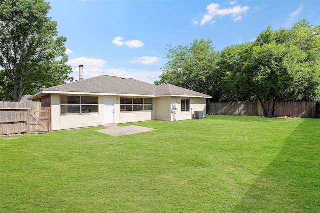 14118 Magnolia Springs Dr, Houston, TX 77066 - rear view of house with central AC unit and roof with shingles