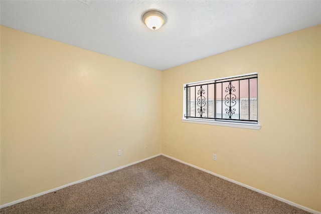 14118 Magnolia Springs Dr, Houston, TX 77066 - spare room featuring carpet and baseboards