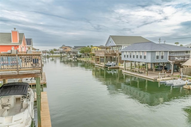 22113 Matagorda Dr, Galveston, TX 77554 - dock featuring a water view and a residential view