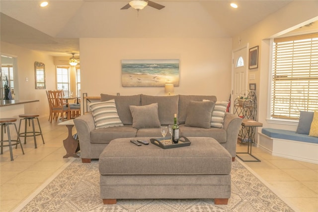 22113 Matagorda Dr, Galveston, TX 77554 - living room with a ceiling fan, vaulted ceiling, tile patterned floors, recessed lighting, and healthy amount of natural light