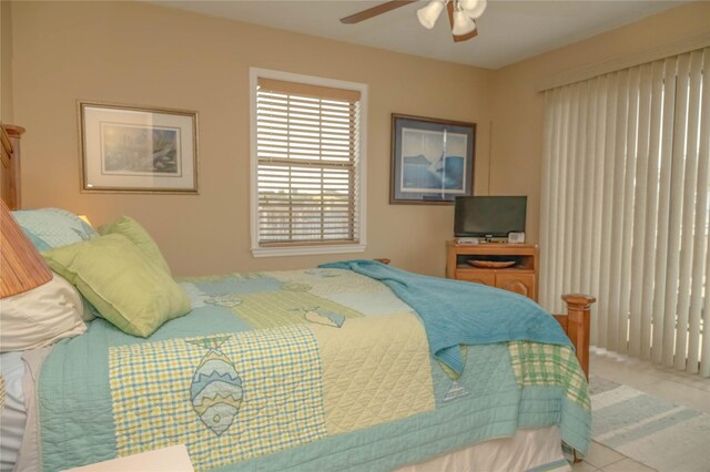 22113 Matagorda Dr, Galveston, TX 77554 - tiled bedroom with ceiling fan