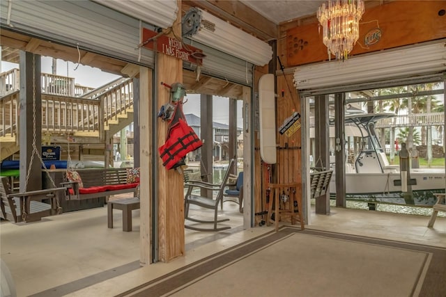 22113 Matagorda Dr, Galveston, TX 77554 - doorway to outside featuring a chandelier