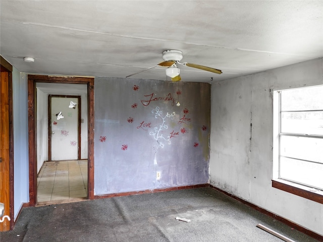 3200 Moore Ave, Bay City, TX 77414 - spare room with ceiling fan, baseboards, carpet, and a smoke detector
