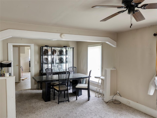 3200 Moore Ave, Bay City, TX 77414 - dining room with light carpet and a ceiling fan