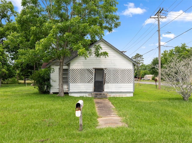3200 Moore Ave, Bay City, TX 77414 - view of front of home with a front yard