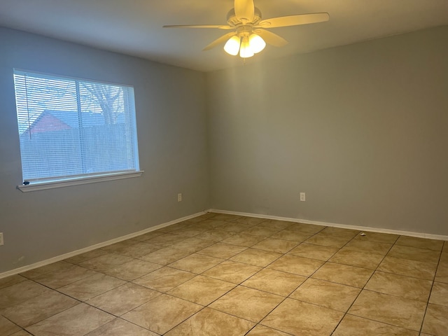 5306 Deborah Ln, Baytown, TX 77521 - spare room with ceiling fan, baseboards, and light tile patterned floors