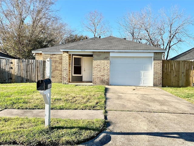 5306 Deborah Ln, Baytown, TX 77521 - view of front of property with brick siding, driveway, and roof with shingles