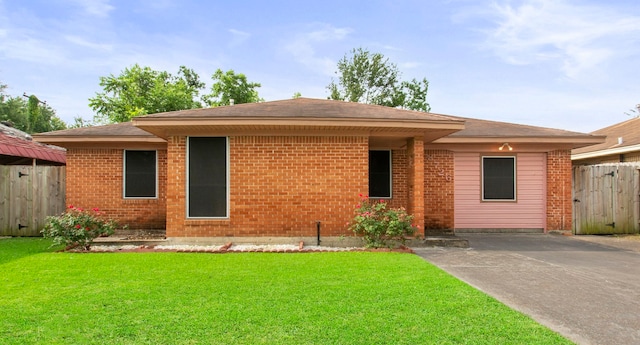 8726 Tilgham St, Houston, TX 77029 - ranch-style house with brick siding and roof with shingles