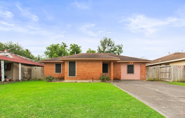 8726 Tilgham St, Houston, TX 77029 - ranch-style house with brick siding and driveway