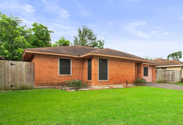8726 Tilgham St, Houston, TX 77029 - ranch-style house with brick siding and a shingled roof