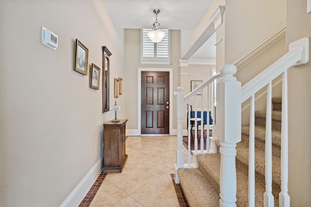 14418 Brushy Arbor Ln, Humble, TX 77396 - foyer featuring stairway, light tile patterned floors, and baseboards