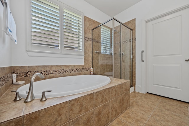 14418 Brushy Arbor Ln, Humble, TX 77396 - full bathroom with a garden tub, a stall shower, and tile patterned floors
