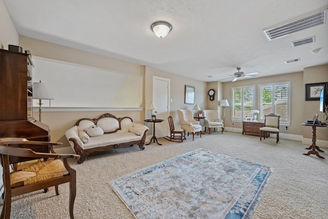 14418 Brushy Arbor Ln, Humble, TX 77396 - living area with carpet, a ceiling fan, and baseboards