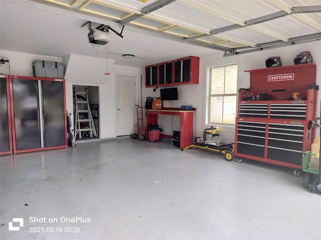 127 Augusta Dr, Woodcreek, TX 78676 - garage featuring a garage door opener