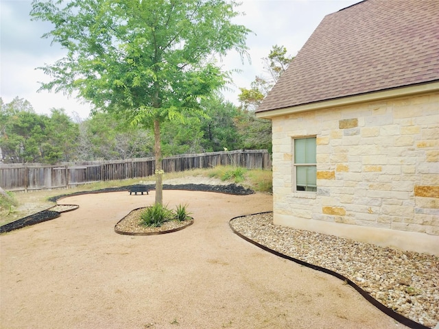 127 Augusta Dr, Woodcreek, TX 78676 - fenced backyard featuring a patio