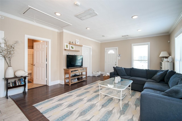 2116 Carter St, Houston, TX 77008 - living room with attic access, ornamental molding, baseboards, recessed lighting, and wood finished floors