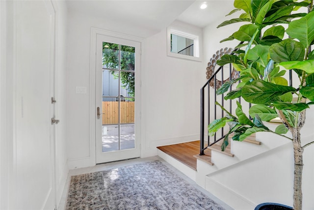 5439 Darling St, Houston, TX 77007 - doorway with stairway, baseboards, and recessed lighting