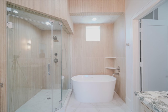 5439 Darling St, Houston, TX 77007 - bathroom featuring a freestanding tub, a stall shower, and vanity