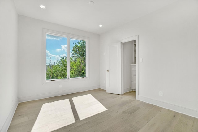 5439 Darling St, Houston, TX 77007 - empty room with light wood-type flooring, baseboards, and recessed lighting